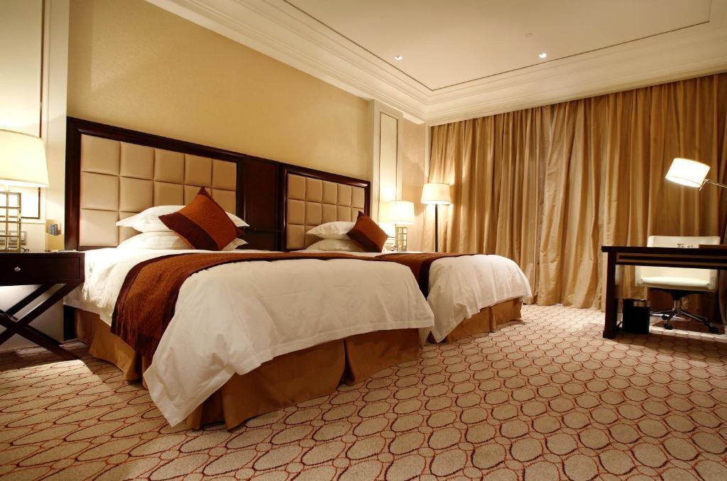 Landison Green Town Hotel Xinchang Chambre photo